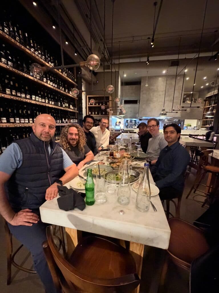Guests gathered around the table at MindFort's Tech Week security dinner
